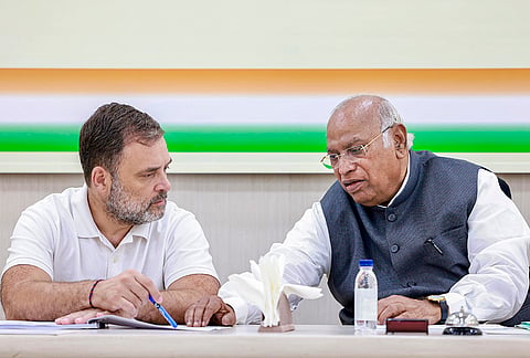 Congress President and LoP in the Rajya Sabha Mallikarjun Kharge interacts with LoP in the Lok Sabha Rahul Gandhi during a Congress Central Election Committee (CEC) meeting for Kerala, in New Delhi. 