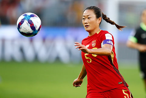 China's Wu Haiyan runs after the ball during the Women's Asian Cup semifinal soccer match between China and Australia in Perth, Australia.
