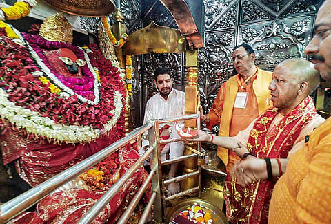 Uttar Pradesh Chief Minister Yogi Adityanath offers prayers at the Vindhyavasini temple, in Mirzapur, Uttar Pradesh. 