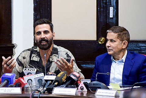 BMC Commissioner Bhushan Gagrani, right, with actor and film producer Akshay Kumar during the announcement of the cleanliness-related competition 'Mumbai Clean League', at the BMC Headquarters, in Mumbai.