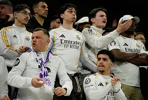 Real Madrid fans react during the Champions League round of 16 second leg soccer match between Manchester City and Real Madrid in Manchester.