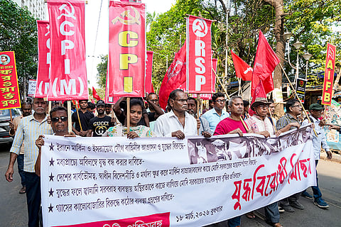 Left Front activists during an anti-war rally led by party chairman Biman Bose, in Kolkata.