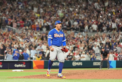 Venezuela pitcher Daniel Palencia celebrates after the team defeated the United States in the championship game of the World Baseball Classic, in Miami. 