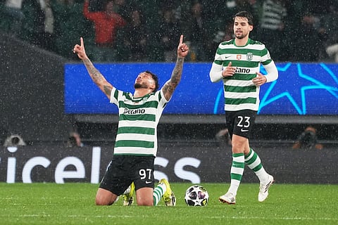 Sporting's Luis Suarez celebrates after scoring his side's third goal during a Champions League round of 16 second leg soccer match between Sporting CP and Bodo Glimt in Lisbon, Portugal.
