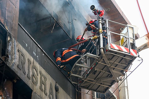 Rescue operations underway after a fire broke out in a residential building near Palam Metro station, in New Delhi. Seven people, including three children, were killed.