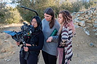 Shaping Stories Through Light: Netraa Dave’s Journey In Cinematography And As A Gaffer Netraa Dave filming outdoors with two other women