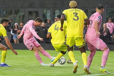 Inter Miami forward Lionel Messi (10) aims to score his 900th goal during a CONCACAF Champions Cup Round of 16 soccer match against Nashville, in Fort Lauderdale, Florida.