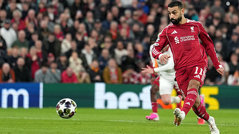 Liverpool's Mohamed Salah takes and misses a penalty during the second leg of the Champions League round of 16 soccer match between Liverpool and Galatasaray, in Liverpool, England, Wednesday, March 18, 2026.