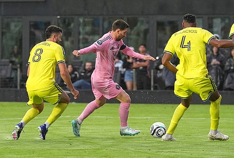 Inter Miami forward Lionel Messi (10) aims to score his 900th goal during a CONCACAF Champions Cup Round of 16 soccer match against Nashville, in Fort Lauderdale, Florida.
