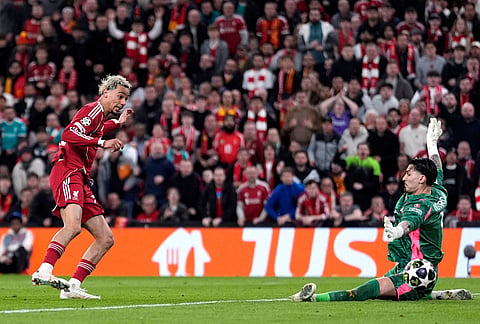 Liverpool's Hugo Ekitike scores his side's second goal during the second leg of the Champions League round of 16 soccer match between Liverpool and Galatasaray, in Liverpool, England.