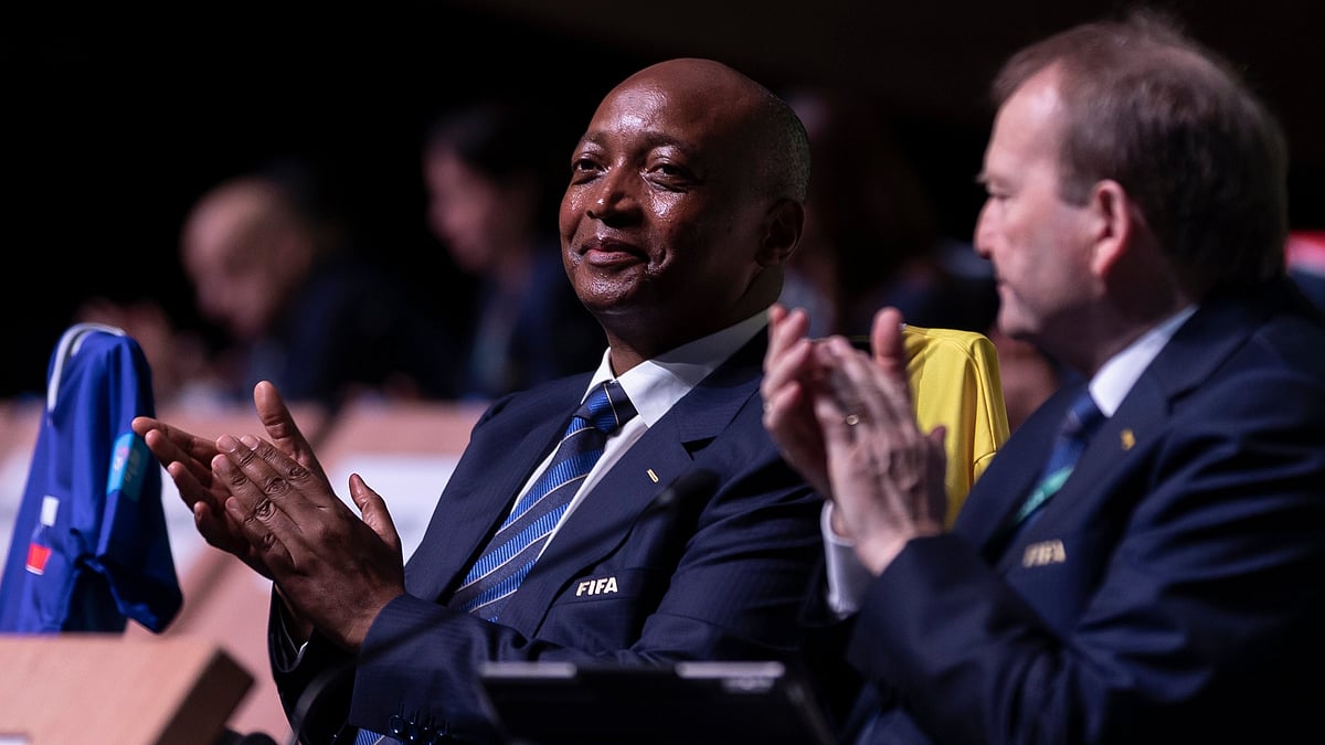 | Photo: AP : Confederation of African Football (CAF) President Patrice Motsepe claps during the 73rd FIFA Congress, in Kigali, Rwanda, March 16, 2023.
