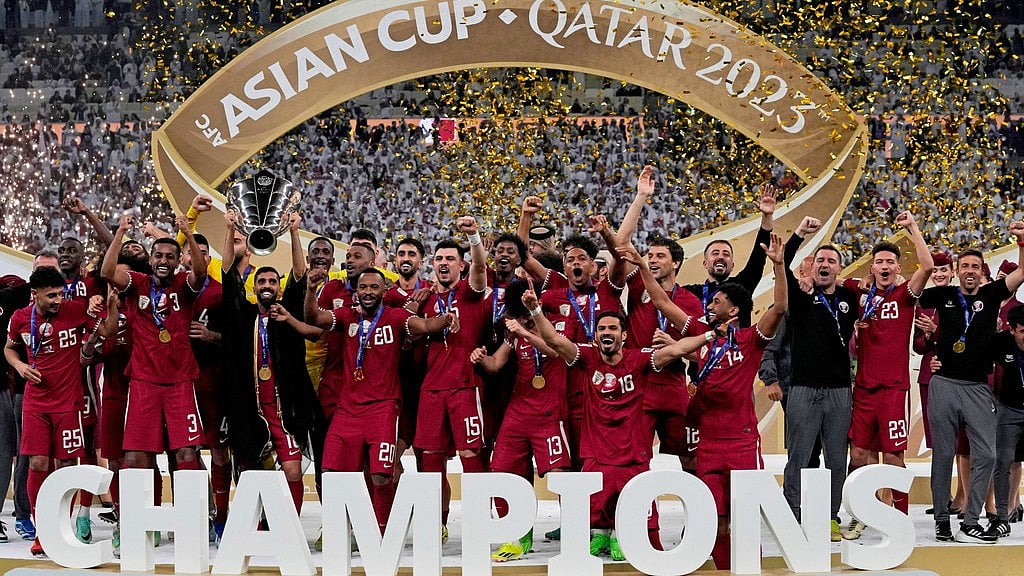 The Qatar team poses with the trophy at the end of the Asian Cup 2023 final between Qatar and Jordan at the Lusail Stadium in Lusail. - File/AP