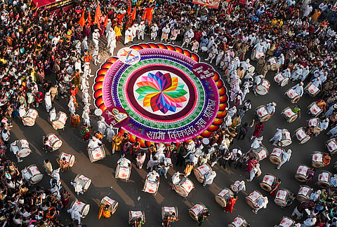 People dressed in traditional attire take part in a procession on the occasion of the 'Gudhi Padwa' festival, in Mumbai, Maharashtra.