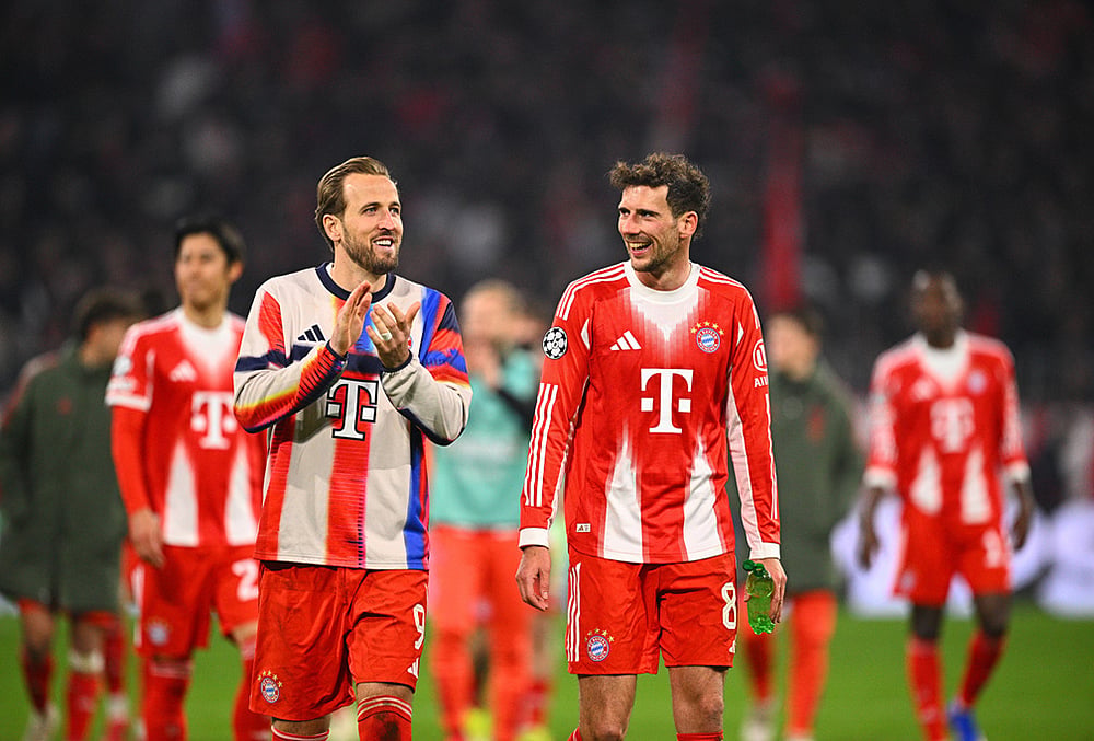| Photo: Tom Weller/dpa via AP : Bayern Munich's Harry Kane and Leon Goretzka react after a match against Atalanta Bergamo in Munich, Germany.