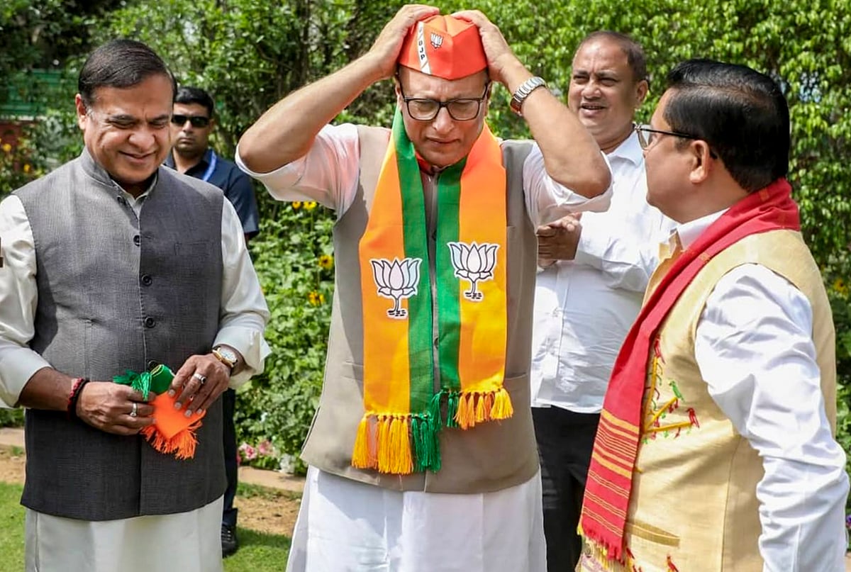 PTI : On March 18, Assam Chief Minister Himanta Biswa Sarma, left, and BJP Assam president Dilip Saikia, right, welcome Nagaon MP Pradyut Bordoloi into the Bharatiya Janata Party, in New Delhi. 