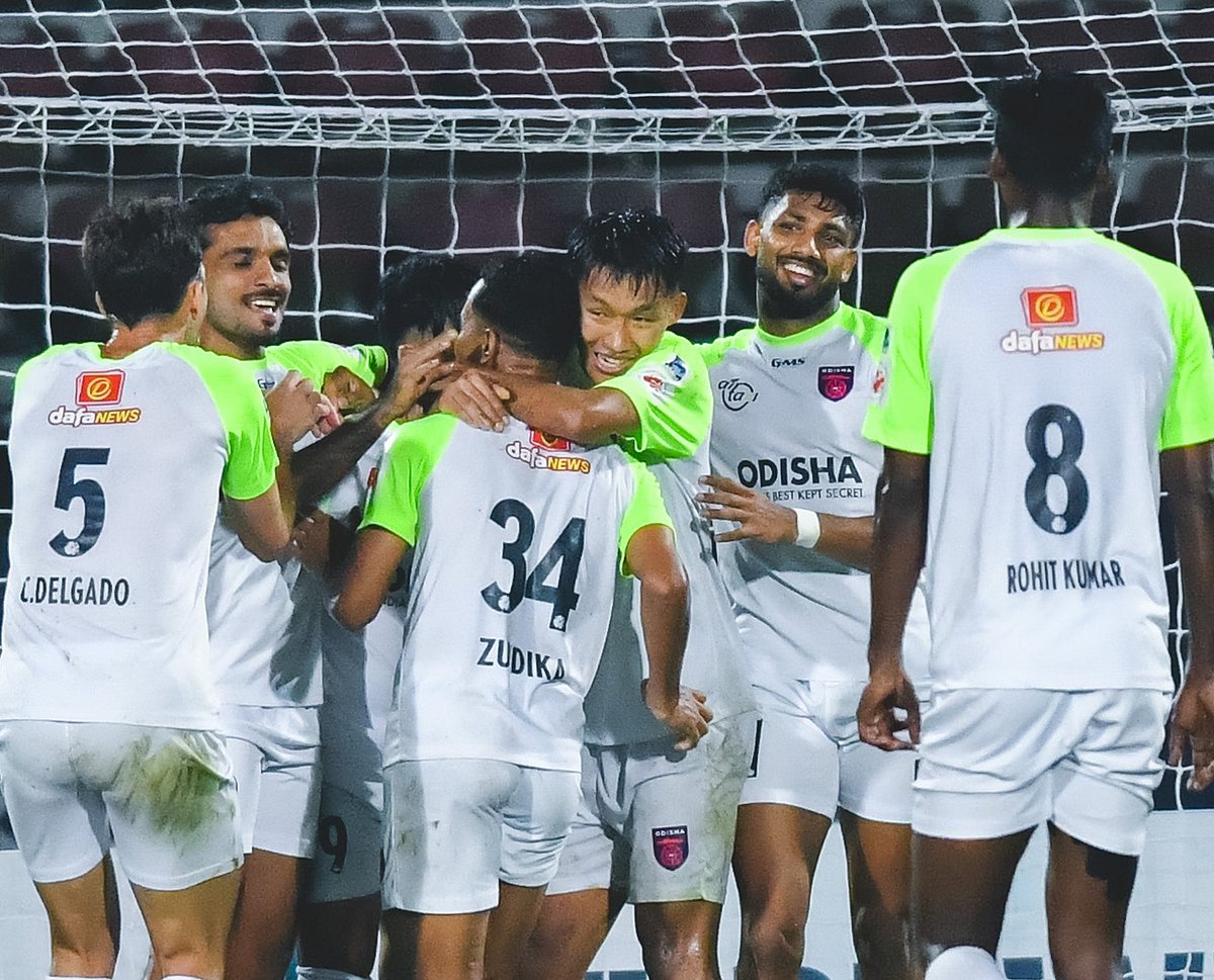 IndSuperLeague/X : Odisha FC footballers celebrating a goal against NorthEast United in ISL 2025-26. 