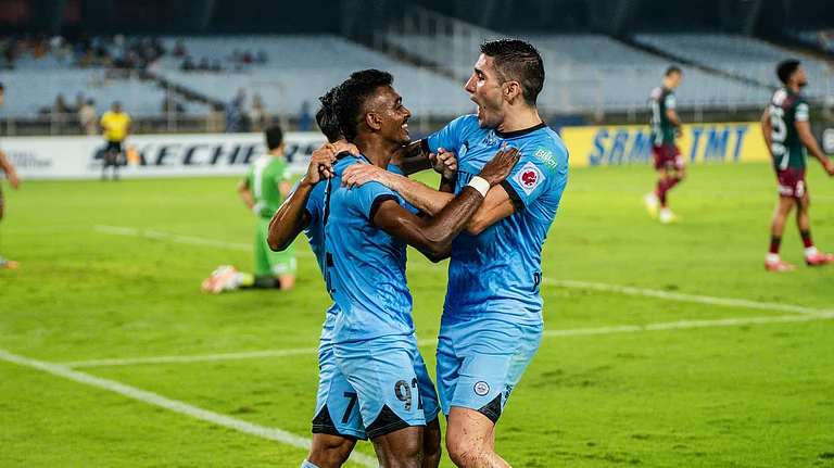 Mumbai City FC players celebrate after scoring a goal against Mohun Bagan during ISL 2025-26. - AIFF