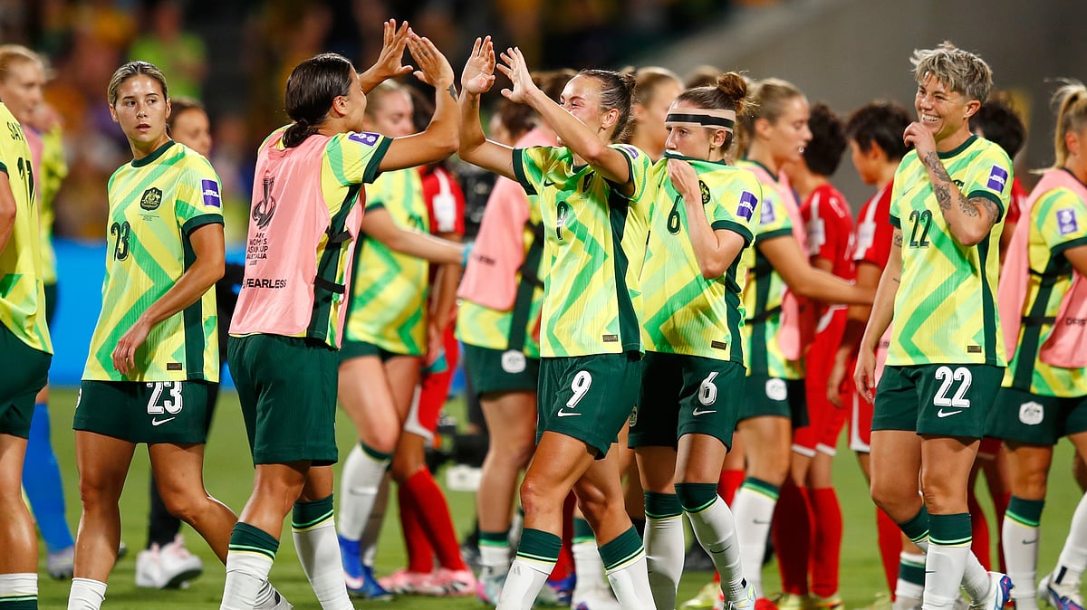 (AP Photo/Gary Day) : Australia's Sam Kerr and teammate Australia's Caitlin Foord celebrate following the Women's Asian Cup quarterfinal soccer match between Australia and North Korea in Perth, Australia, Friday, March 13, 2026. 