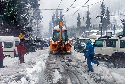 Snow-clearance work underway after the area received fresh snowfall, in the Solang Valley area, Kullu.