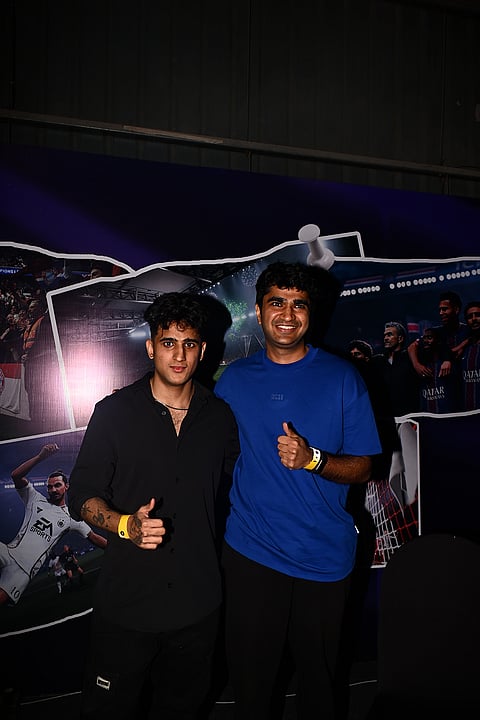 Saransh Jain (right), one of India's top-ranked FC 26 players, poses at the qualifiers after earning his spot in the Mumbai City FC lineu