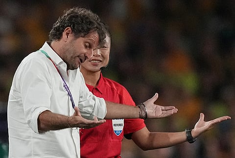Australia's coach Joseph Montemurro gestures during the Women's Asian Cup soccer final between Japan and Australia in Sydney.