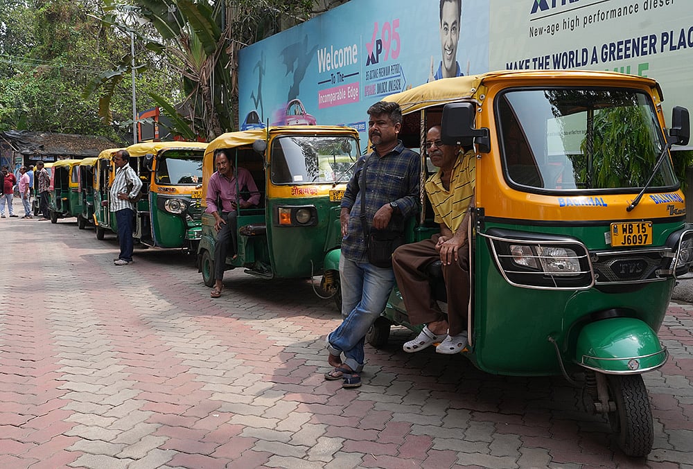 Auto Rickshaw drivers waiting for refueling LPG at Pump in Hooghly District