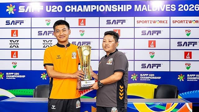 Bhutan U20 captain Rinzin Dorji and head coach Sonam Dhendup with the SAFF U20 Championship trophy. - | Photo: Instagram/saff_football