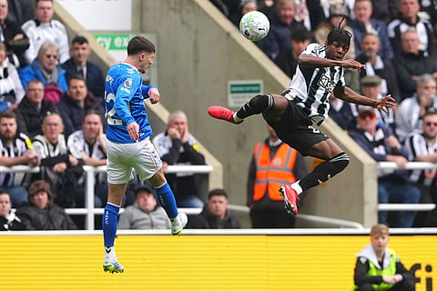 Sunderland's Trai Hume, left, and Newcastle United's Anthony Elanga battle for the ball during the Premier League match between Newcastle and Sunderland outside St James' Park, Newcastle upon Tyne, England.