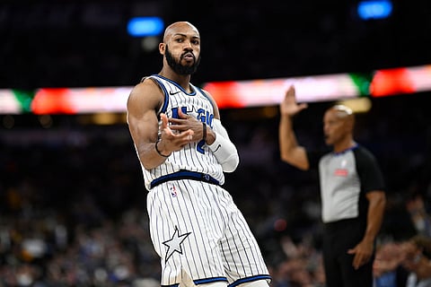 Orlando Magic guard Jevon Carter (2) reacts after scoring a basket during the second half of an NBA basketball game against the Los Angeles Lakers in Orlando, Fla.