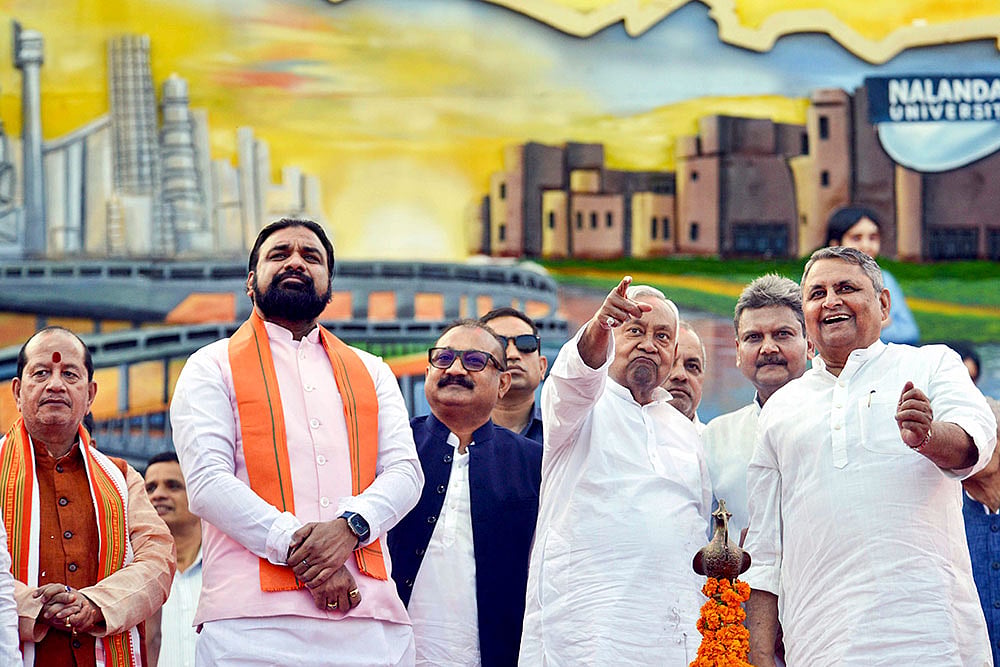 | Photo: PTI : Bihar Chief Minister Nitish Kumar with state Deputy CM Samrat Choudhary during an event on "Bihar Diwas", the day on which the province, which was earlier a part of the Bengal presidency, came into being over a century ago, in Patna.