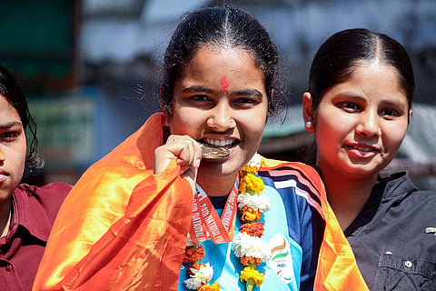 Para athlete Riya being welcomed in her residence’s area after she won a gold medal in the shot put event at the 24th National Para Athletics Championships 2026, in Meerut.