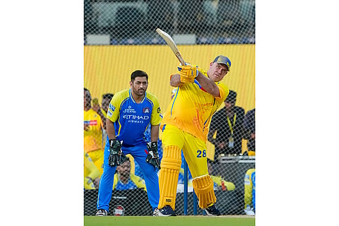 Commentator and former cricketer Matthew Hayden, right, plays a shot during the Chennai Super Kings’ ROAR 2026, pre-season fan event, at M. A. Chidambaram Stadium in Chennai.