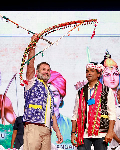 Leader of Opposition in the Lok Sabha Rahul Gandhi with others during the 'Adivasi Adhikar Samvidhan Sammelan', in Vadodara, Gujarat. 