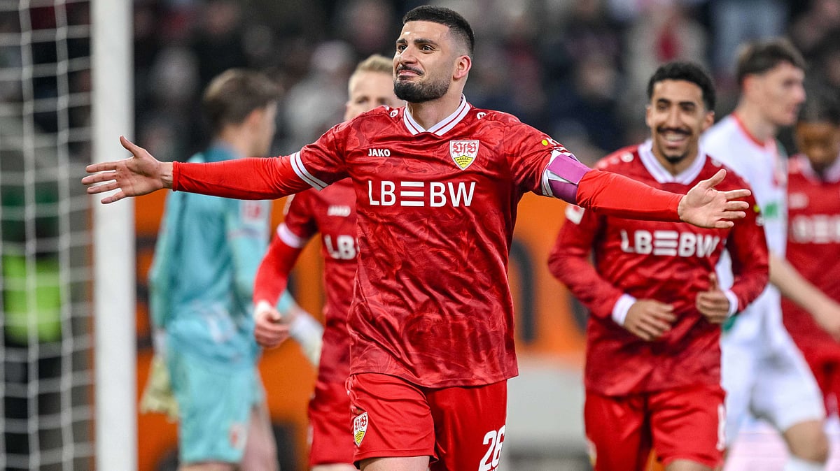 | Photo: dpa/Harry Langer via AP : Stuttgart's Deniz Undav, front, celebrates after scoring his side's fourth goal during the German Bundesliga soccer match between FC Augsburg and VfB Stuttgart in Augsburg, Germany, Sunday, March 22, 2026.