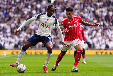 Tottenham Hotspur's Mathys Tel, left and Nottingham Forest's Igor Jesus vie for the ball, during the English Premier League soccer match between Tottenham Hotspur and Nottingham Forest, in London.