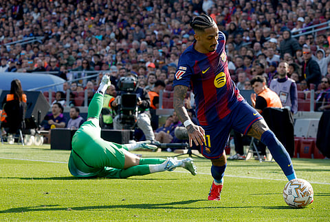 Barcelona's Raphinha in action during a La Liga soccer match between Barcelona and Rayo Vallecano in Barcelona.