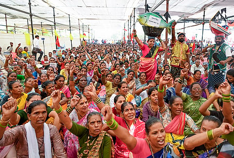 Citizens, farmers, fishing community members, and various environmental organizations participate in a rally against the proposed Vadhvan Port project, demanding the protection of forests and mangroves, in Mumbai.