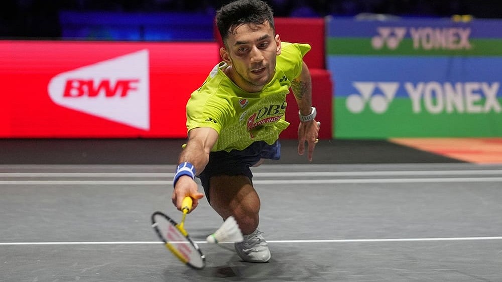 India's Lakshya Sen plays against Canada's Victor Lai during the men's singles semifinal match at the All England Open Badminton Championships in Birmingham, England. - | Photo: AP/Kin Cheung