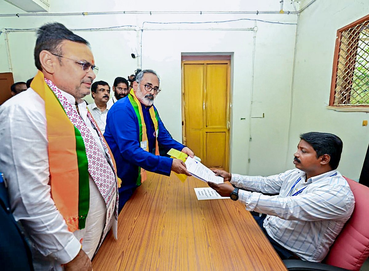 In this image posted on March 21, 2026, Rajasthan Chief Minister Bhajanlal Sharma with BJP Kerala President and candidate from Nemom Assembly constituency, Rajeev Chandrasekhar, as the latter files his nomination for state Assembly elections.
 - -Source: PTI
