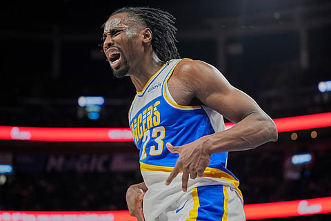 Indiana Pacers guard Aaron Nesmith (23) reacts after sinking a 3-point shot against the Orlando Magic during the second half of an NBA basketball game  in Orlando, Fla.