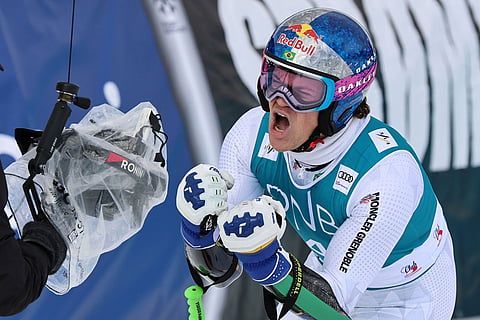 Brazil's Lucas Pinheiro Braathen celebrates winning an alpine ski, men's giant slalom race, at the Lillehammer World Cup Finals, in Hafjell, Norway.