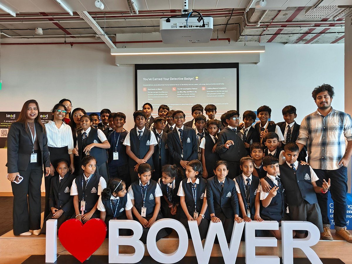 Students posing with I ❤️ BOWER sign