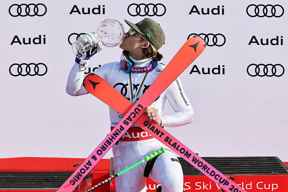 Brazil's Lucas Pinheiro Braathen holds the globe trophy for the alpine ski, men's giant slalom discipline title, at the Lillehammer World Cup Finals, in Hafjell, Norway. - | Photo: AP/Marco Trovati