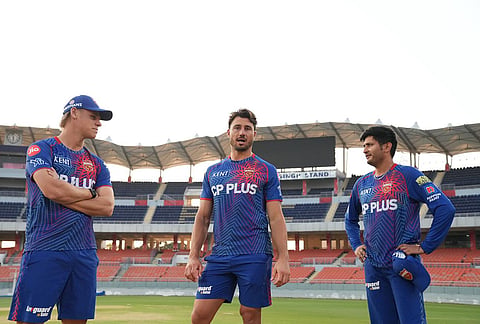 Marcus Stoinis, Cooper Connolly and Priyansh Arya chat during the PBKS training session in Mohali