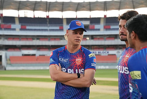 Cooper Connolly in a chat with Marcus Stoinis and Priyansh Arya during the PBKS training session