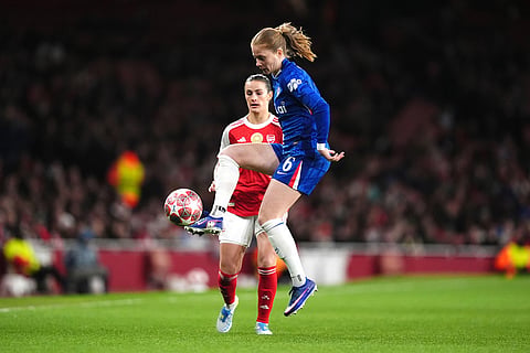 Chelsea's Sjoeke Nusken, right, and Arsenal's Emily Fox battle for the ball during the Women's Champions League match in London.