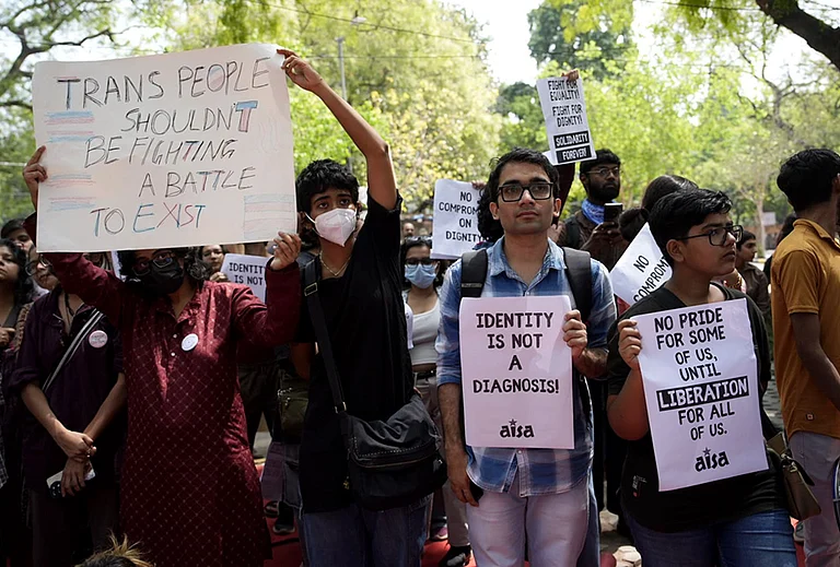 Supporters of the LGBTQIA+ community hold placards during a protest against the passage of the Transgender Persons (Protection of Rights) Amendment Bill, 2026, at Jantar Mantar in New Delhi. - | Photo: Vikram Sharma/Outlook