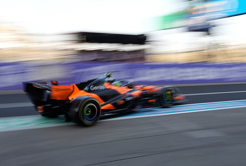 McLaren driver Lando Norris of Britain steers his car during the second practice session of the Japanese Formula One Grand Prix in Suzuka, Japan.