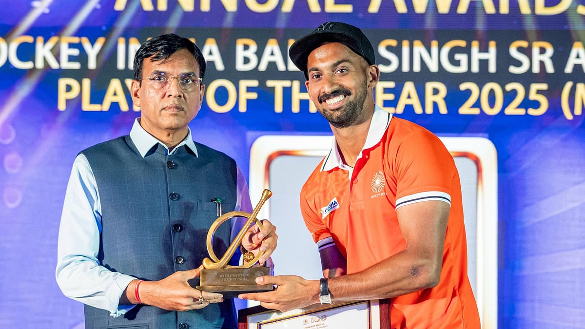 Hockey India : Hardik Singh receives men's player of the year award from Hockey India. 