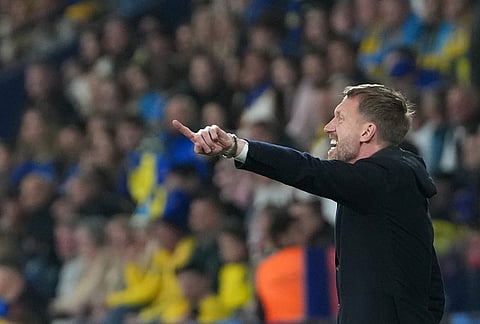 Sweden's head coach Graham Potter gives instructions to his players during a World Cup playoff semifinal soccer match between Ukraine and Sweden in Valencia, Spain.